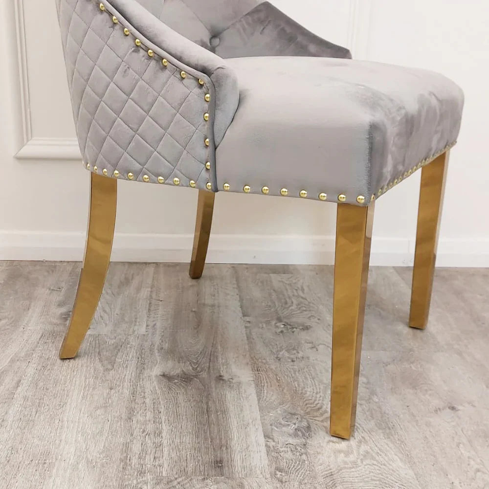 Louis Gold Marble Dining Table with 4 Bentley Lion Knocker Velvet Chairs - UK Online Furniture